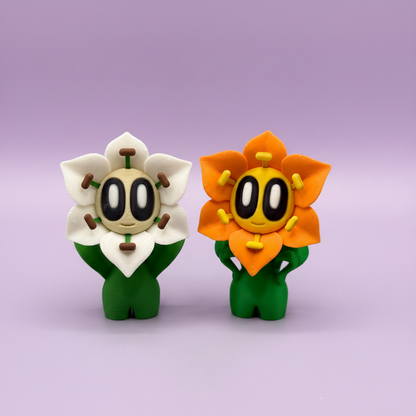 Zwei Blob-Blumen mit passendem Lavendelhintergrund